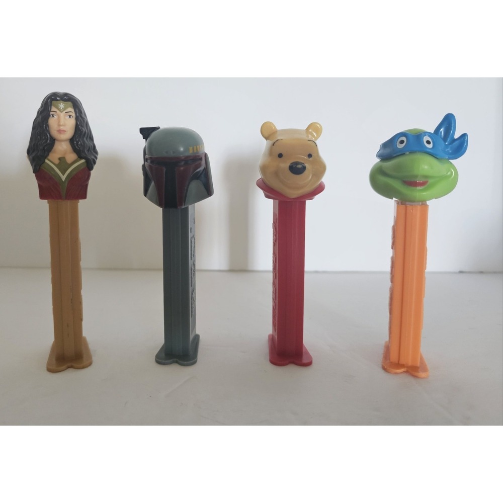 Vintage 4 Pez Dispensers Pooh, Ninja Turtle, And Others